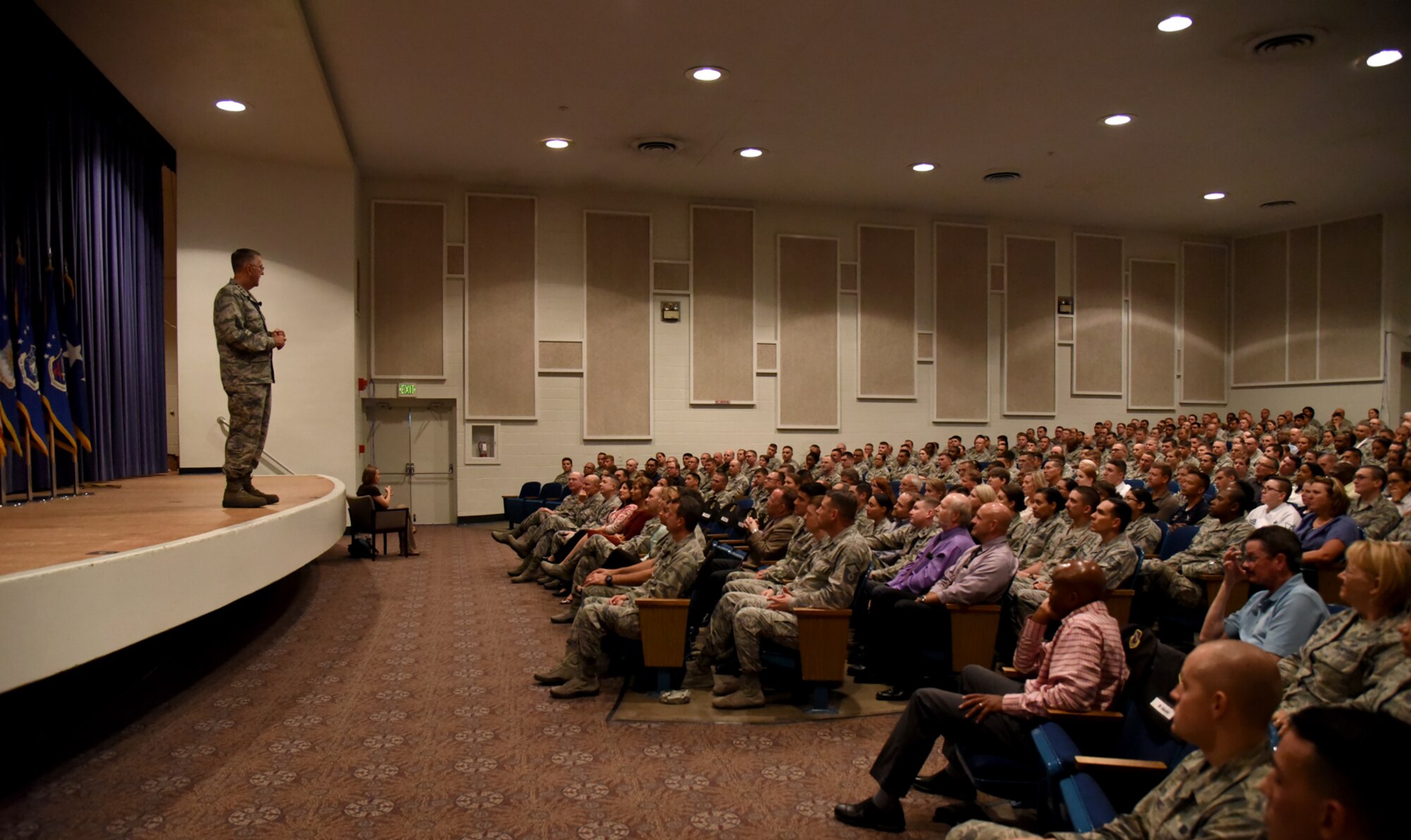 General John Hyten, Air Force Space Command commander, addresses Team Pete at an all call at the base auditorium on Peterson Air Force Base, Colo., Aug. 4, 2016. During his talk, General Hyten recognized the importance of the 21st Space Wing and discussed several issues, including his command priorities of  winning today’s fight, preparing for tomorrow’s fight, and taking care of our Airmen and our families; the damage caused from the recent hail storm that struck the base; and the topic of suicide within the Air Force (U.S. Air Force photo by Airman 1st Class Dennis Hoffman)