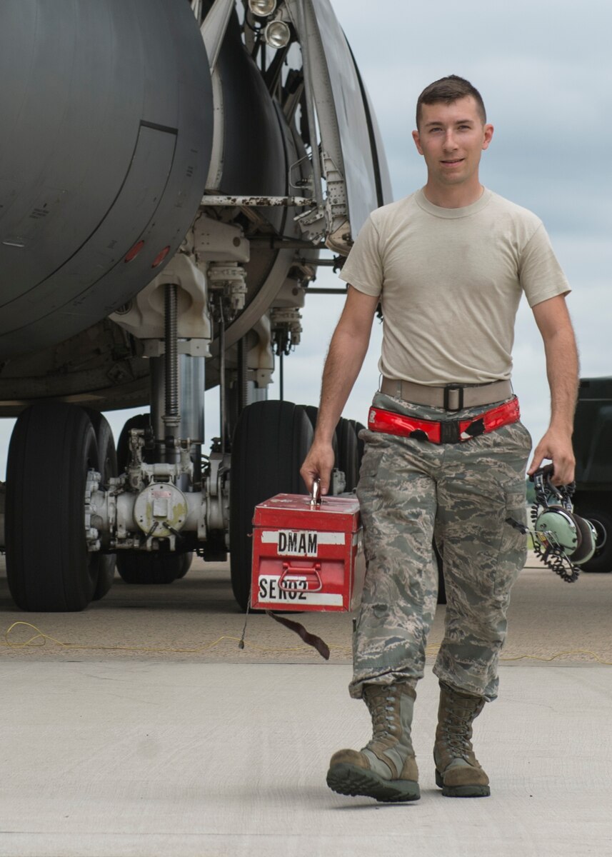 Senior Airman Matthew Nenzoski, 436th Aircraft Maintenance Squadron crew chief, Dover Air Force Base, Del., walks aside a C-5 Super Galaxy after completing a maintenance task Aug. 2, 2016, Joint Base McGuire-Dix-Lakehurst, NJ. Nenzoski was part of a TDY to JB MDL after part of the the Dover AFB runway closed for reconstruction. (U.S. Air Force Photo/ Staff Sgt. Tiffany Lindemann)