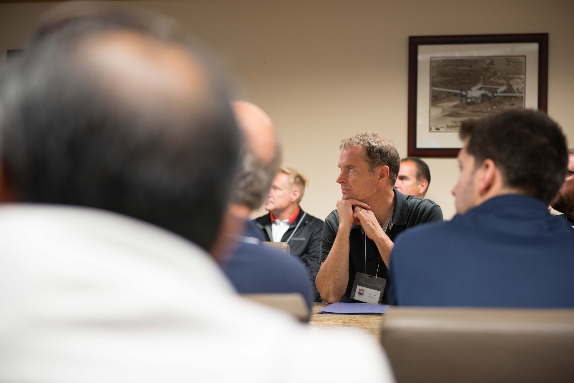 Civilian Employers of Reservists receive a mission briefing from Col. Tony Polashek, 934th Airlift Wing commander, during Employers Day Aug. 6.