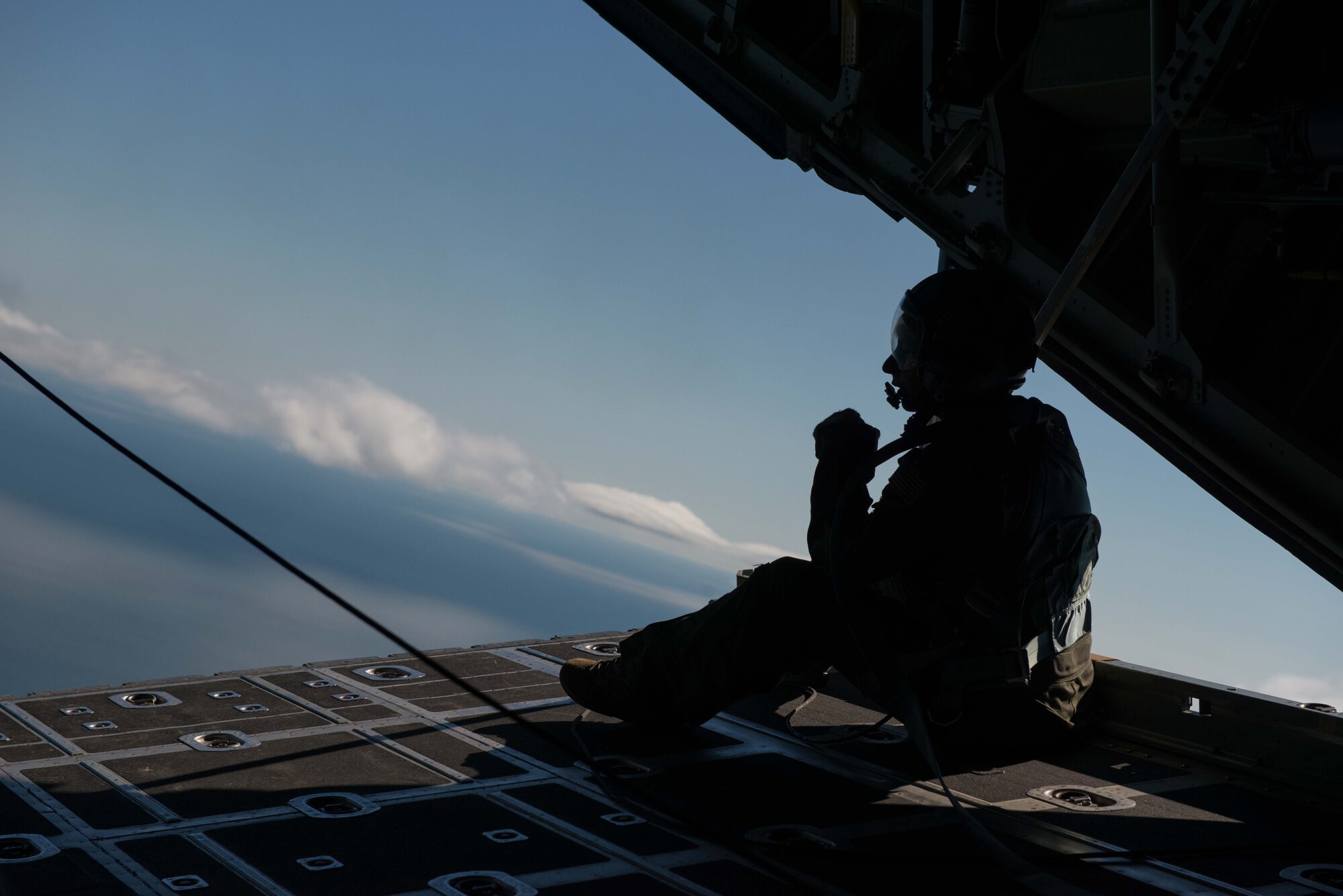 A 96th Airlift Squadron loadmaster flys aboard a C-130 Hecules during Employers Day Aug. 6.