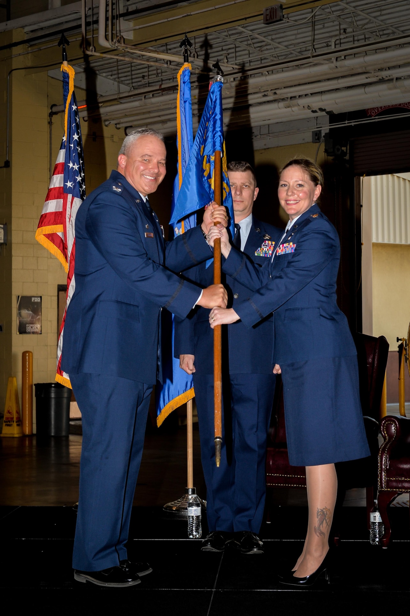 Maj. Tiffany Arnold accepts command of the 2nd Maintenance Support Squadron during a change of command ceremony at Barksdale Air Force Base, La., June 24, 2016. During the permanent change of station season at Barksdale, 19 changes of command took place over the summer months, to include turnover in 13 squadrons and three groups, including the wing itself. (U.S. Air Force photo/ Senior Airman Mozer O. Da Cunha)