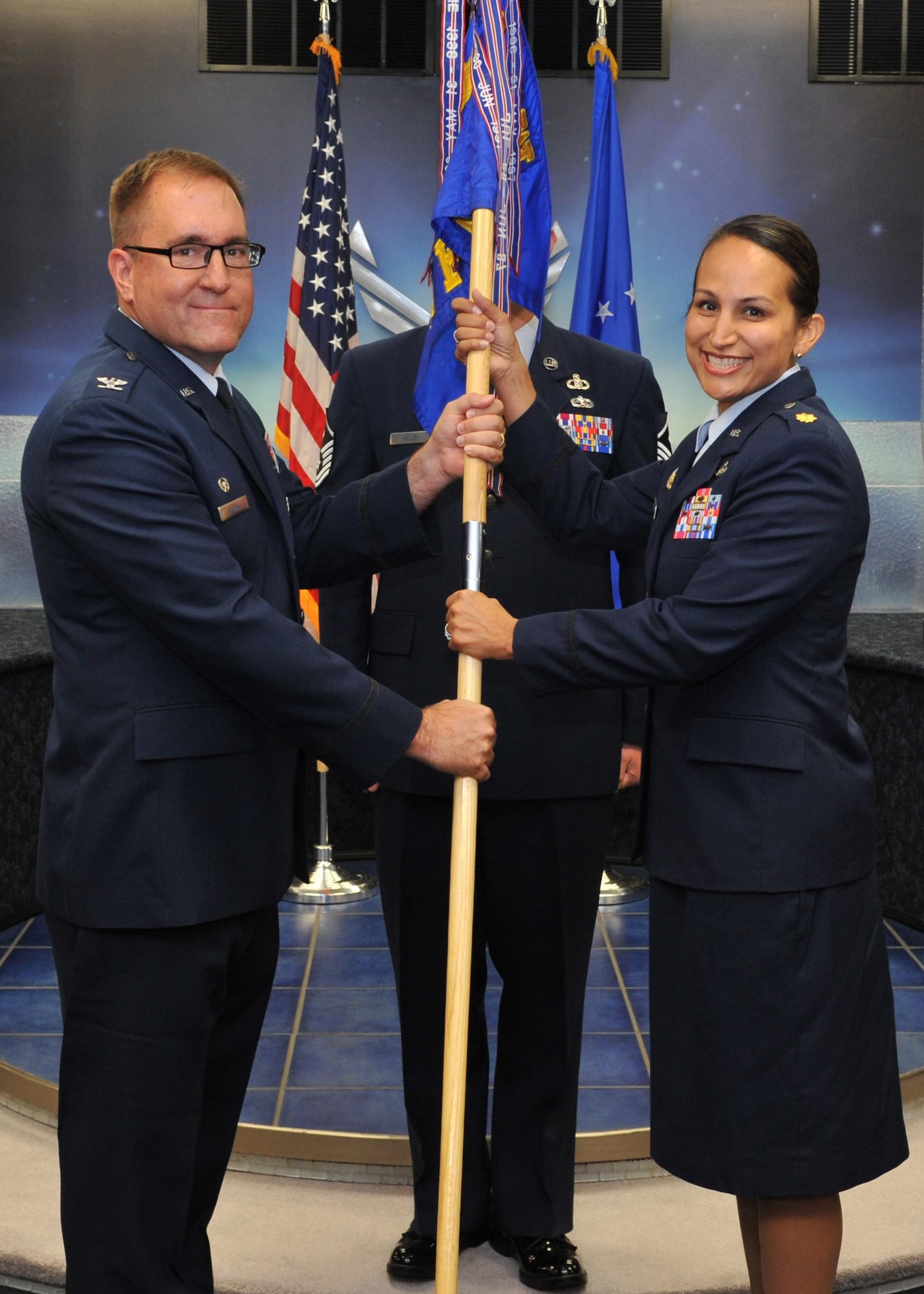 Maj. Mindy Davitch accepts command of the 2nd Force Support Squadron during a change of command ceremony at Barksdale Air Force Base, La., June, 17, 2016. During the permanent change of station season at Barksdale, 19 changes of command took place over the summer months, to include turnover in 13 squadrons and three groups, including the wing itself. (U.S. Air Force photo /Senior Airman Joseph Raatz)