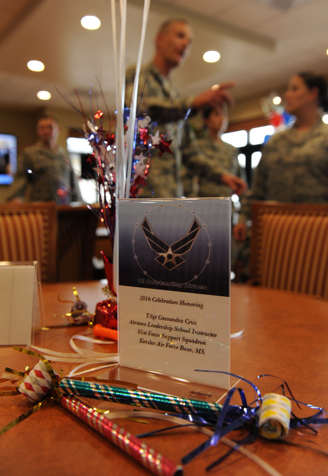 Keesler personnel gather at the Bay Breeze Event Center during a recognition ceremony for Tech. Sgt. Cassandra Cruz, 81st Force Support Squadron Airman Leadership School instructor, for her selection as one of the 12 Outstanding Airmen of the Year Aug. 2, 2016, on Keesler Air Force Base, Miss. This award recognizes 12 enlisted personnel for their superior leadership, job performance, community involvement and personal achievements. (U.S. Air Force photo by Kemberly Groue/Released)