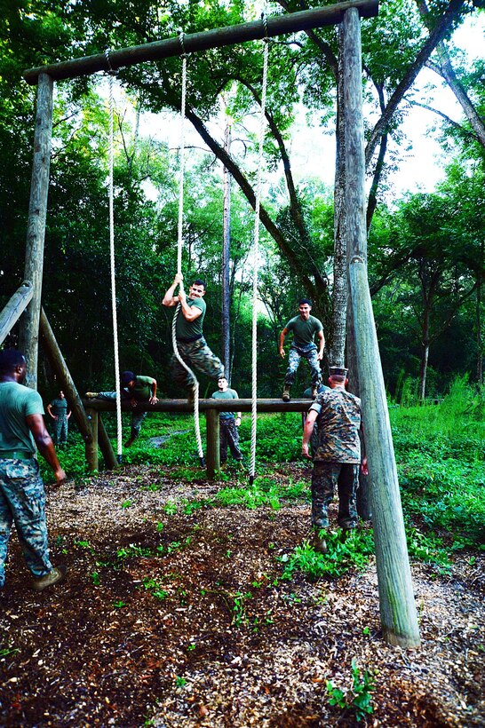 Marines with Headquarters Company East, Marine Corps Logistics Command, navigate the Endurance Course aboard Marine Corps Logistics Base Albany, July 28.