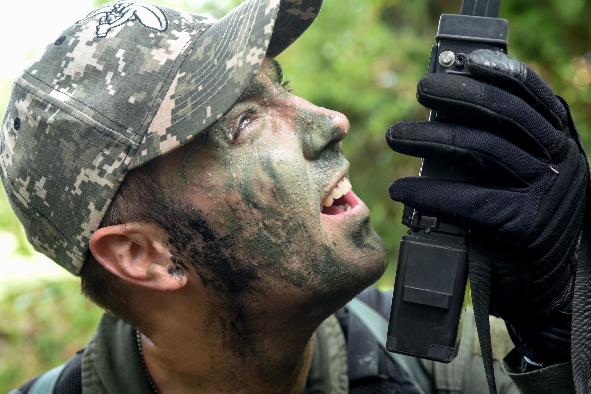 First Lt. James Hendershaw, 336th Fighter Squadron weapon systems officer, uses his combat survival evader locator to try and make contact an allied aircraft during the Razor Talon exercise Aug. 5, 2016, near Smyrna, North Carolina. The CSEL is used by aircrew to support survival, evasion, and personnel recovery operations and provides secure two-way communication with nearby friendly forces. (U.S. Air Force photo by Airman Shawna L. Keyes)