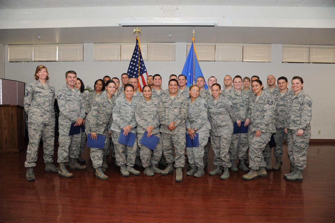 Facilitators and graduates of the Noncommissioned Officer Leadership Development Course gathered at the Base Chapel to commemorate their completion of the five-day course Aug. 5, 2016. The NCOLDC is held annually and targeted to Air Reserve Component (ARC) and Active Guard Reserve (AGR) members with the rank Staff Sergeant and Technical Sergeant. (U.S. Air Force photo by Tech. Sgt. Pete Dean)
