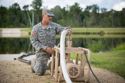 U.S. Army Spc. Trevor Swart, 651st Quartermaster Company, Casper, Wyo., inspects a Raw Water Pump during Combat Support Training Exercise (CSTX) 86-16-03 at Fort McCoy, Wis., August 7, 2016. The 84th Training Command’s third and final Combat Support Training Exercise of the year hosted by the 86th Training Division at Fort McCoy, Wis. is a multi-component and joint endeavor aligned with other reserve component exercises. (U.S. Army photo by Spc. John Russell/Released)