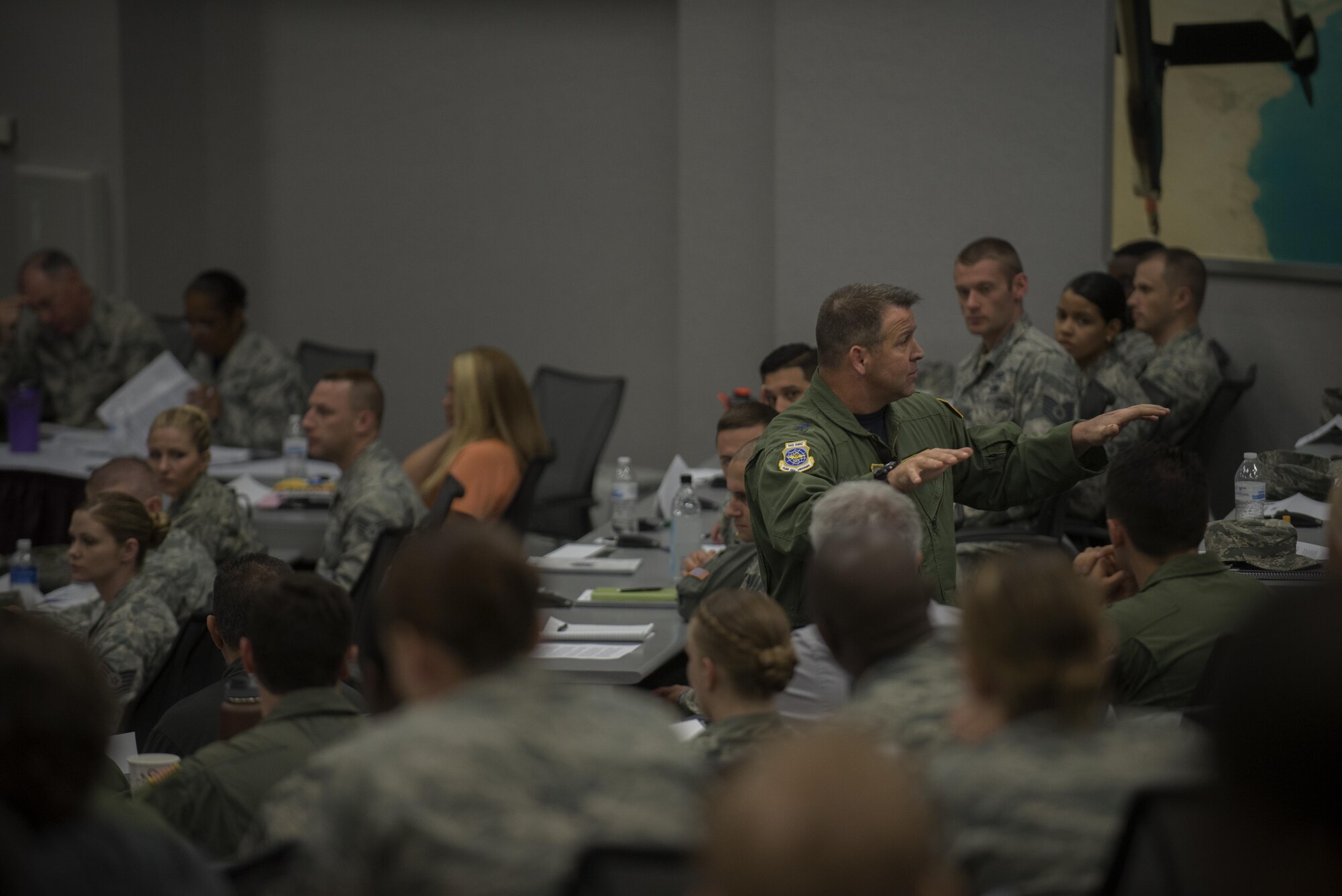 Maj. Gen. Thomas Sharpy; Air Mobility Command strategic plans, requirements and programs director; tells the participants of the Phoenix Stripe convention about the differences between leaders and managers at the Global Reach Planning Center at Scott Air Force Base, Illinois, July 3, 2016. (U.S. Air Force photo/Senior Airman Jake Eckhardt)