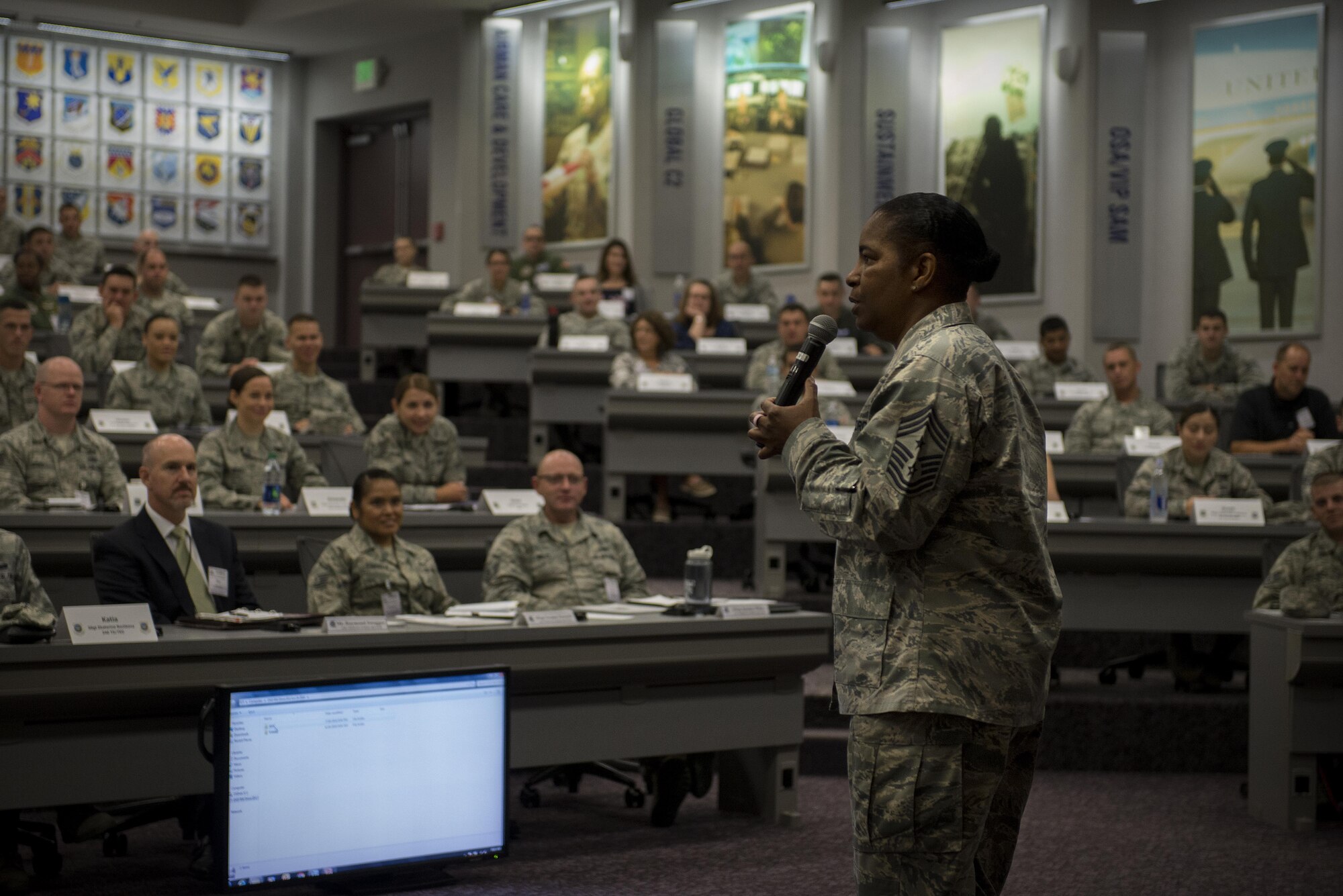 Command Chief Master Sgt. Shelina Frey, Air Mobility Command, begins the Phoenix Stripe convention July 3, 2016, at the Global Reach Planning Center at Scott Air Force Base, Illinois. Phoenix Stripe is a professional development program geared toward providing up and coming staff and technical sergeants with an overview of how AMC operates at the headquarters level and its role in the war on terrorism.  (U.S. Air Force photo/Senior Airman Jake Eckhardt) 