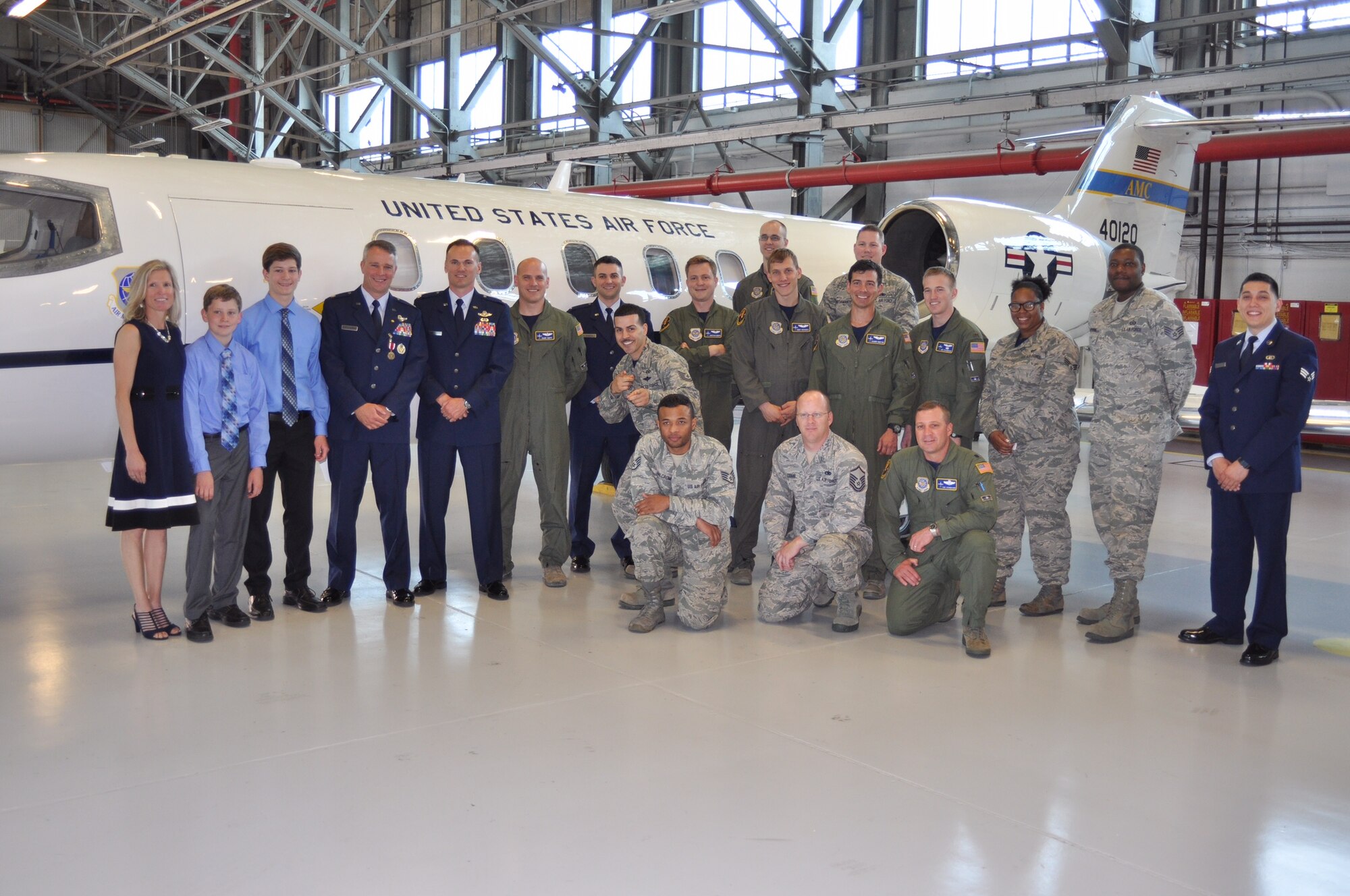 Members of the 457th Airlift Squadron gather for the retirement of Lt. Col.