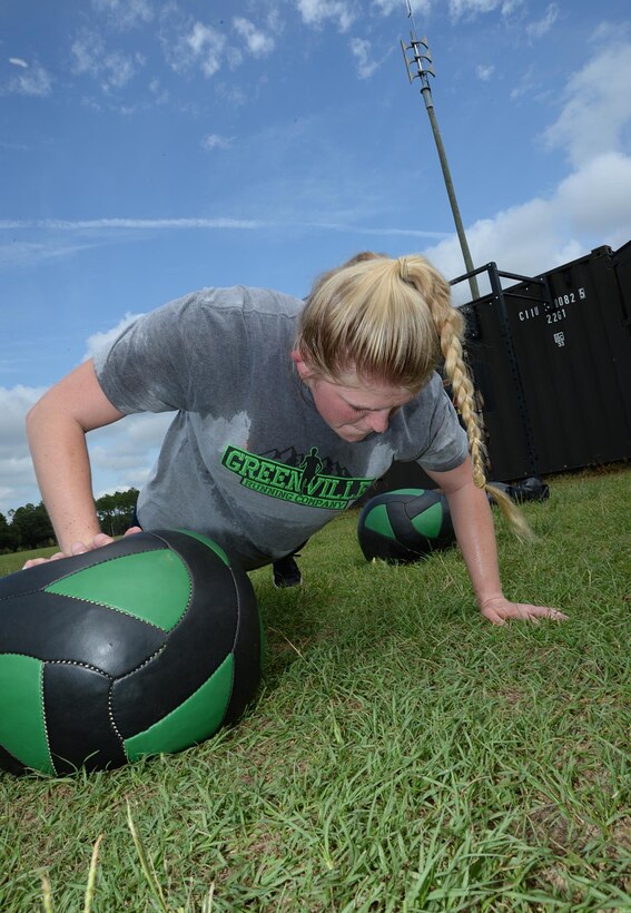 2nd Lt. Delaney T. Bourlakov, adjutant, Marine Corps Logistics Base Albany, conducts a Plyo-pushup during her High Intensity Tactical Training class, Aug. 5. She is preparing for her competition at the second annual High Intensity Tactical Training Athlete Championship, Aug. 15-18, at Marine Corps Air Station Miramar in San Diego, Calif.