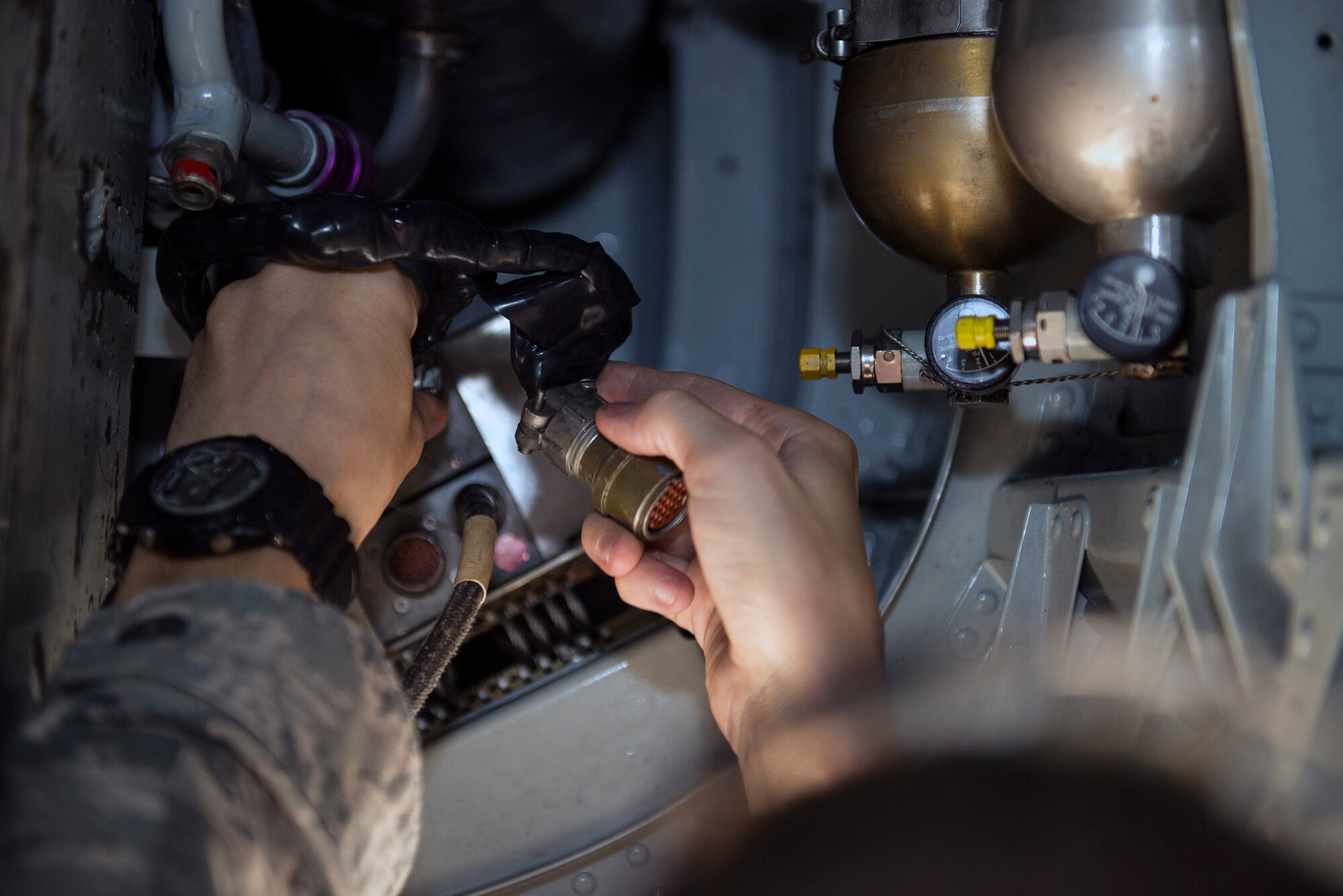 A U.S. Air Force Airman from the 476th Aircraft Maintenance Squadron’s specialty flight connects preamplifiers in an A-10C Thunderbolt II during a rear warning receiver systems test, Aug. 8, 2016, at Moody Air Force Base, Ga. The receiver allows Moody’s A-10 pilots to detect missiles from adversaries through its radar system. (U.S. Air Force photo by Airman 1st Class Greg Nash)