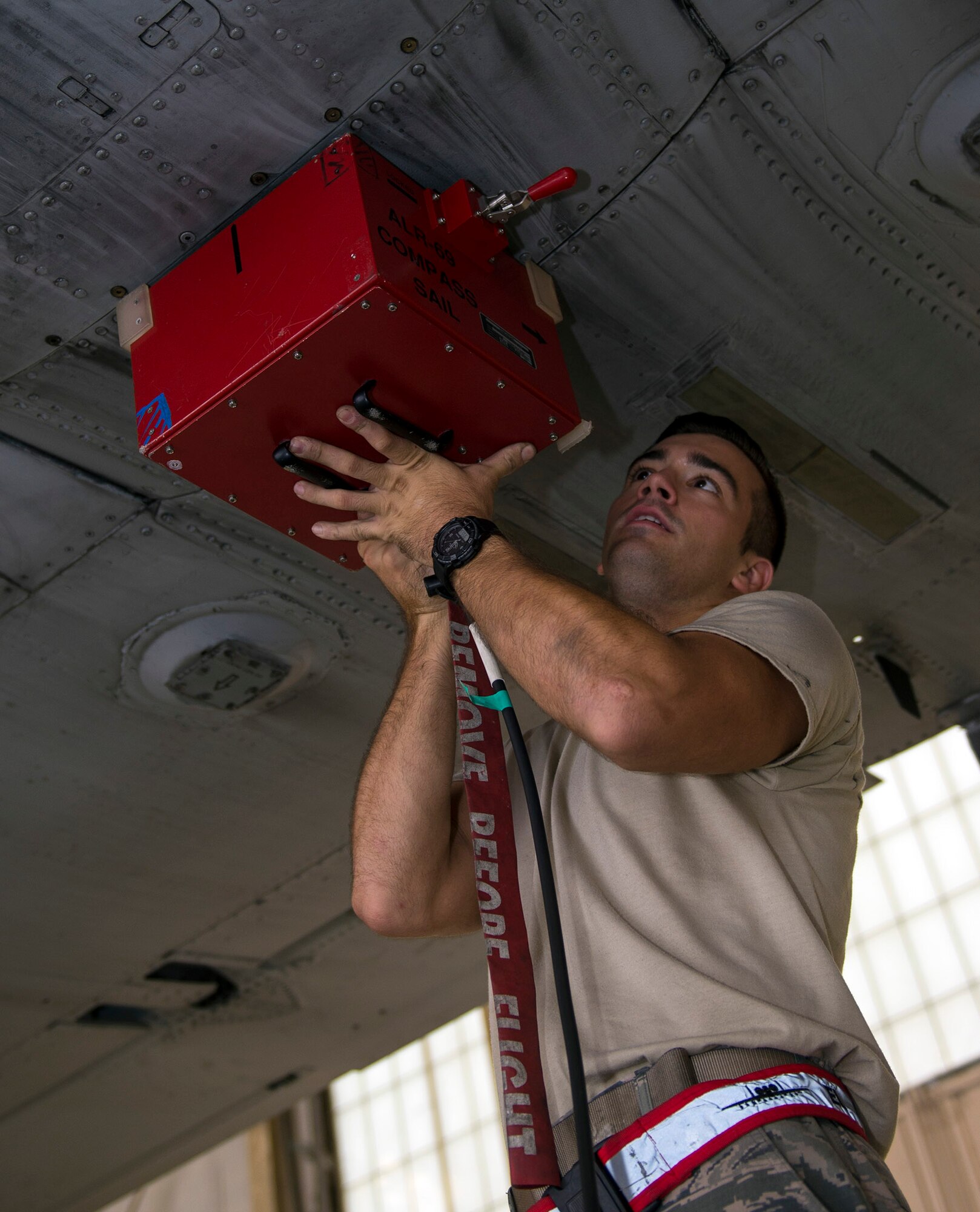 U.S. Air Force Senior Airman Menmedalija Pasic, 476th Aircraft Maintenance Squadron specialty flight avionics technician, assembles a compass sail hat on an A-10C Thunderbolt II while utilizing a joint service electronic combat systems tester, Aug. 9, 2016, at Moody Air Force Base, Ga. The tester’s capabilities include finding threats and analyzing technique and signal responses. (U.S. Air Force photo by Airman 1st Class Greg Nash)
