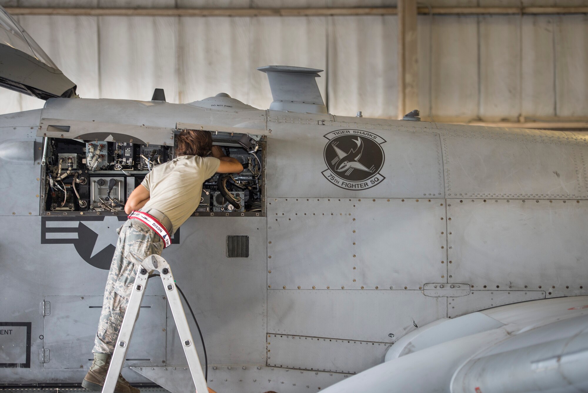 U.S. Air Force Tech. Sgt. Dvorah Dixon, 476th Aircraft Maintenance Squadron specialist flight avionics technician, configures joint service electronic combat systems tester wiring components in the fuselage of an A-10C Thunderbolt II, Aug. 9, 2016, at Moody Air Force Base, Ga. The avionics technicians tested the receiver’s ability to detect enemy missile attacks, which contributes to Moody’s A-10’s survival through improved aircrew situational awareness of the radar guided threat environment. (U.S. Air Force photo by Airman 1st Class Greg Nash)
