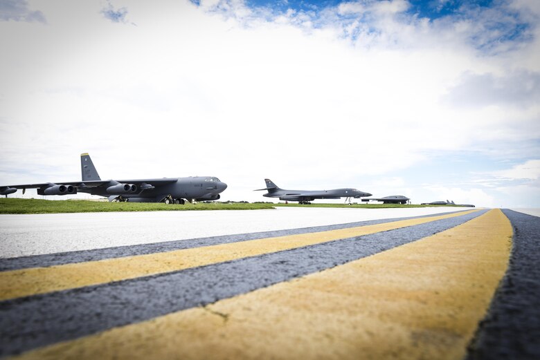 A B-52 Stratofortress, B-1 Lancer and B-2 Spirit sit beside one another on the flightline at Andersen Air Force Base, Guam, Aug.10, 2016. This marks the first time in history that all three of Air Force Global Strike Command's strategic bomber aircraft are simultaneously conducting operations in the U.S. Pacific Command area of operations. The B-1 Lancer, which arrived at Andersen Aug. 6, will replace the B-52 in support of the U.S. Strategic Command Continuous Bomber Presence mission. The CBP bomber swap between the B-1 and B-52 is occurring throughout the month of August as the B-1s return to support this mission for the first time since April 2006. In addition to the CBP bomber swap, three B-2s arrived in theater to conduct a Bomber Assurance and Deterrence deployment. The CBP mission and BAAD deployments are part of a long-standing history of maintaining a consistent bomber presence in the Indo-Asia-Pacific in order to maintain regional stability, and provide assurance to our allies and partners in the region. (U.S. Air Force photo by Tech. Sgt. Richard Ebensberger)