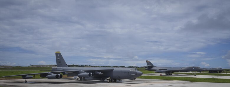 A B-52 Stratofortress, B-1 Lancer and B-2 Spirit sit beside one another on the flightline at Andersen Air Force Base, Guam, Aug.10, 2016. This marks the first time in history that all three of Air Force Global Strike Command's strategic bomber aircraft are simultaneously conducting operations in the U.S. Pacific Command area of operations. The B-1 Lancer, which arrived at Andersen Aug. 6, will replace the B-52 in support of the U.S. Strategic Command Continuous Bomber Presence mission. The CBP bomber swap between the B-1 and B-52 is occurring throughout the month of August as the B-1s return to support this mission for the first time since April 2006. In addition to the CBP bomber swap, three B-2s arrived in theater to conduct a Bomber Assurance and Deterrence deployment. The CBP mission and BAAD deployments are part of a long-standing history of maintaining a consistent bomber presence in the Indo-Asia-Pacific in order to maintain regional stability, and provide assurance to our allies and partners in the region. (U.S. Air Force photo by Tech. Sgt. Richard Ebensberger)
