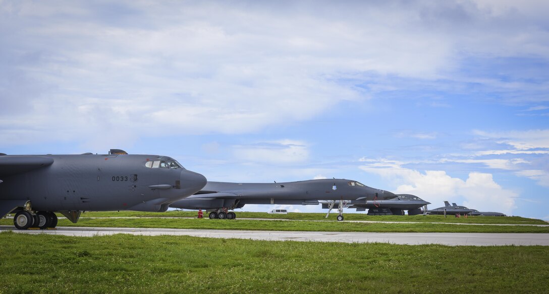A B-52 Stratofortress, B-1 Lancer and B-2 Spirit sit beside one another on the flightline at Andersen Air Force Base, Guam, Aug.10, 2016. This marks the first time in history that all three of Air Force Global Strike Command's strategic bomber aircraft are simultaneously conducting operations in the U.S. Pacific Command area of operations. The B-1 Lancer, which arrived at Andersen Aug. 6, will replace the B-52 in support of the U.S. Strategic Command Continuous Bomber Presence mission. The CBP bomber swap between the B-1 and B-52 is occurring throughout the month of August as the B-1s return to support this mission for the first time since April 2006. In addition to the CBP bomber swap, three B-2s arrived in theater to conduct a Bomber Assurance and Deterrence deployment. The CBP mission and BAAD deployments are part of a long-standing history of maintaining a consistent bomber presence in the Indo-Asia-Pacific in order to maintain regional stability, and provide assurance to our allies and partners in the region. (U.S. Air Force photo by Tech. Sgt. Richard Ebensberger)