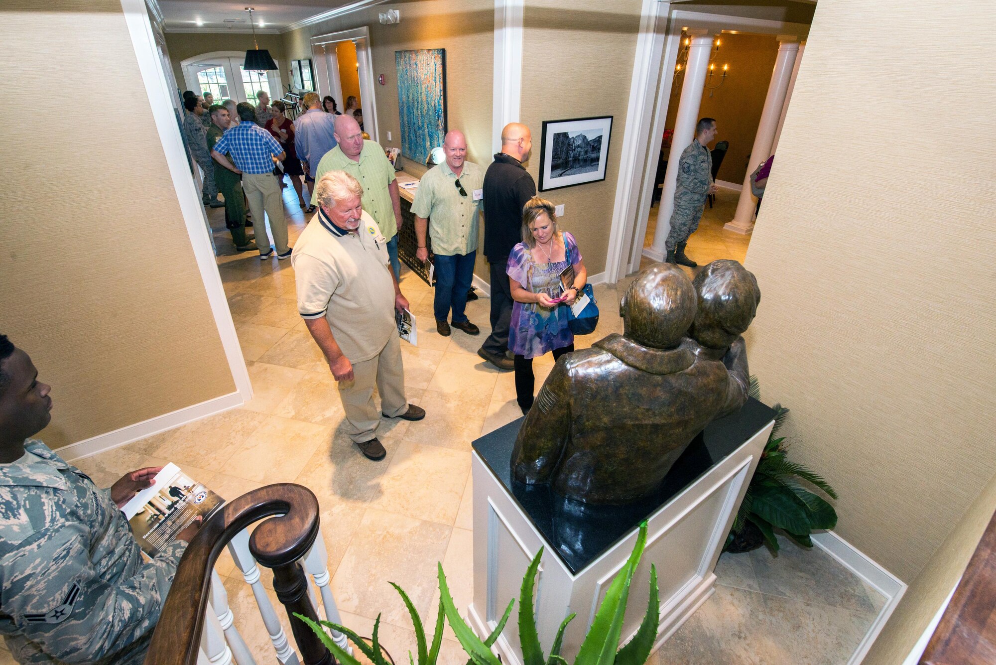 Honorary Commanders visit the Travis Fisher House II during their tour of David Grant USAF Medical Center at Travis Air Force Base, Calif., July 29, 2016. The purpose of the Travis Air Force Base Honorary Commander Program is to promote relationships between base senior leadership and civilian partners, foster civic appreciation of the Air Force mission and its Airmen, maximize opportunities to share the Air Force story with new stewards, and to communicate mutual interest, challenges, and concerns that senior leaders and civilian stakeholders have in common. (U.S. Air Force photo by Louis Briscese)