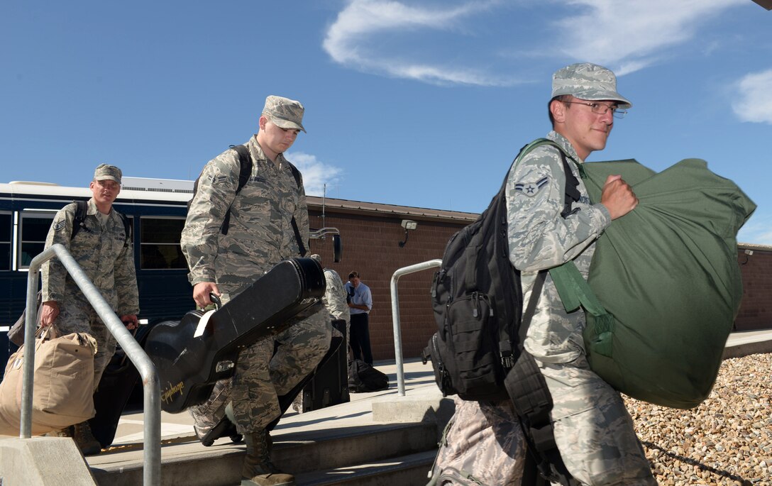Airmen of the 28th Bomb Wing arrive at the deployment center at Ellsworth Air Force Base (AFB), S.D., Aug. 9, 2016. More than 300 Airmen from the 28th Bomb Wing have deployed to Andersen AFB, Guam, to provide assurance and global deterrence for the U.S. Pacific Command and allies. (U.S. Air Force photo by Airman Donald Knechtel) 