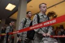 Airmen of the 28th Bomb Wing prepare for screening at Ellsworth Air Force Base, S.D., Aug. 9, 2016. The Airmen will support B-1 bomber missions as part of the U.S. Pacific Command’s continuous bomber presence mission. (U.S. Air Force photo by Airman Donald Knechtel)