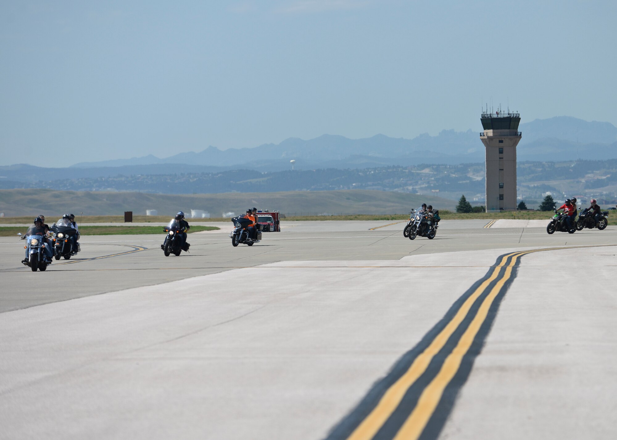 More than 200 Airmen, family members and civilian motorcycle enthusiasts participated in this year’s 16th Annual Dakota Thunder Run at Ellsworth Air Force Base, S.D., Aug. 9, 2016. The event, hosted by the Green Knights Dakota Thunder Motorcycle Club, began on the flight line and offered active military members and veterans the opportunity to tour and photograph a B-1 bomber static display before riding to Sturgis. (U.S. Air Force photo by Senior Airman Anania Tekurio/Released)