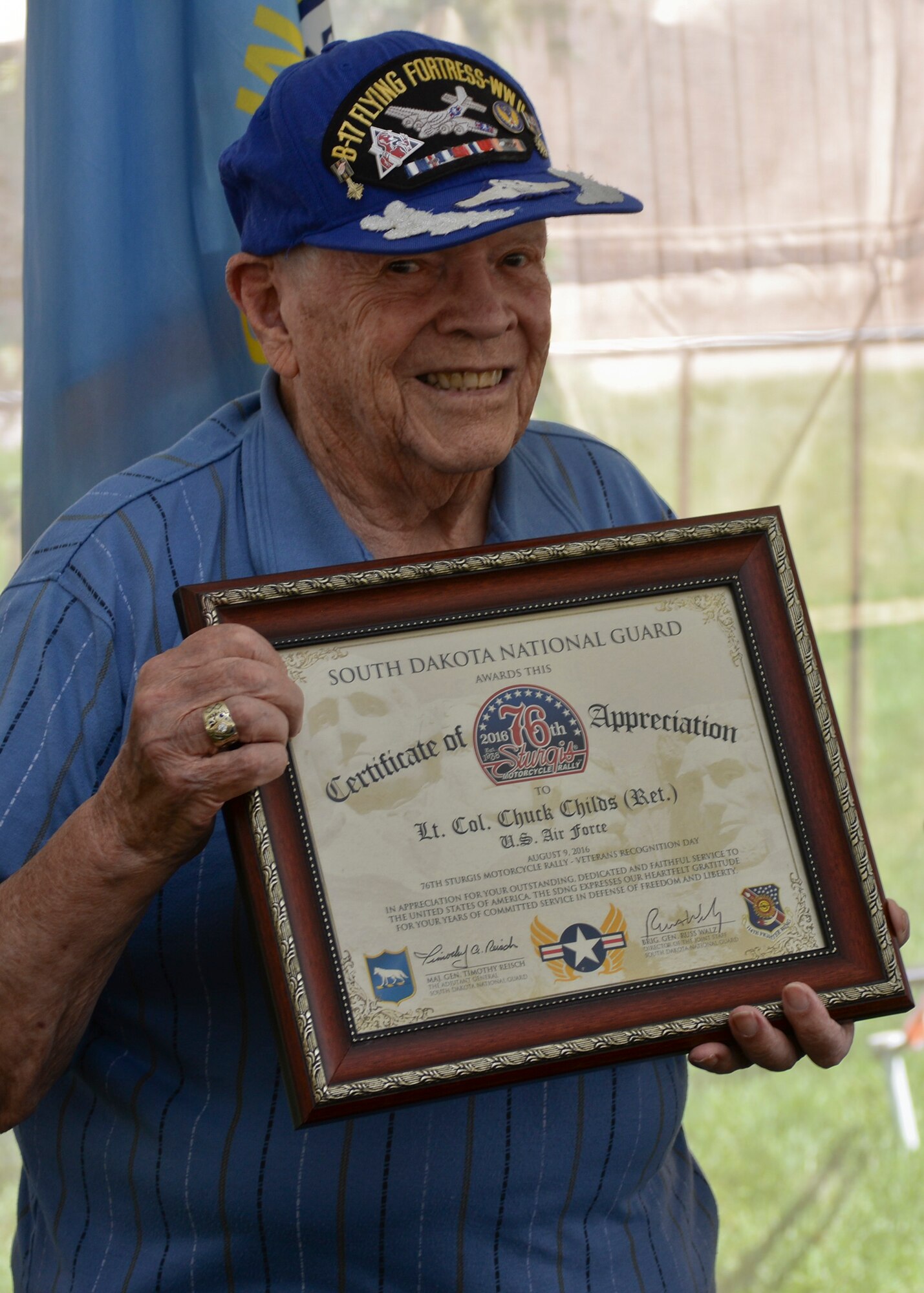 Chuck Childs, a retired Air Force Lieutenant Colonel, was one of two honored during a veterans recognition ceremony at Sturgis, S.D., Aug. 9, 2016. Childs is a WWII and Korean War veteran who earned two Distinguished Flying Crosses flying a B-17 Flying Fortress against the Third Reich. (U.S. Air Force photo by Senior Airman Anania Tekurio/Released)