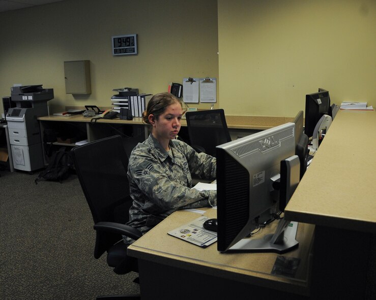 Senior Airman Alexis Zirbel, 2nd Operations Support Squadron airfield management trainee, mans the dispatcher section at the airfield management office at Barksdale Air Force Base, La., August 9, 2016. One of Zirbel’s duties is to issue and cancel NOTAMs, which are notifications to airmen working the airfield about conditions and changes. (U.S. Air Force Photo/Airman 1st Class Stuart Bright) 