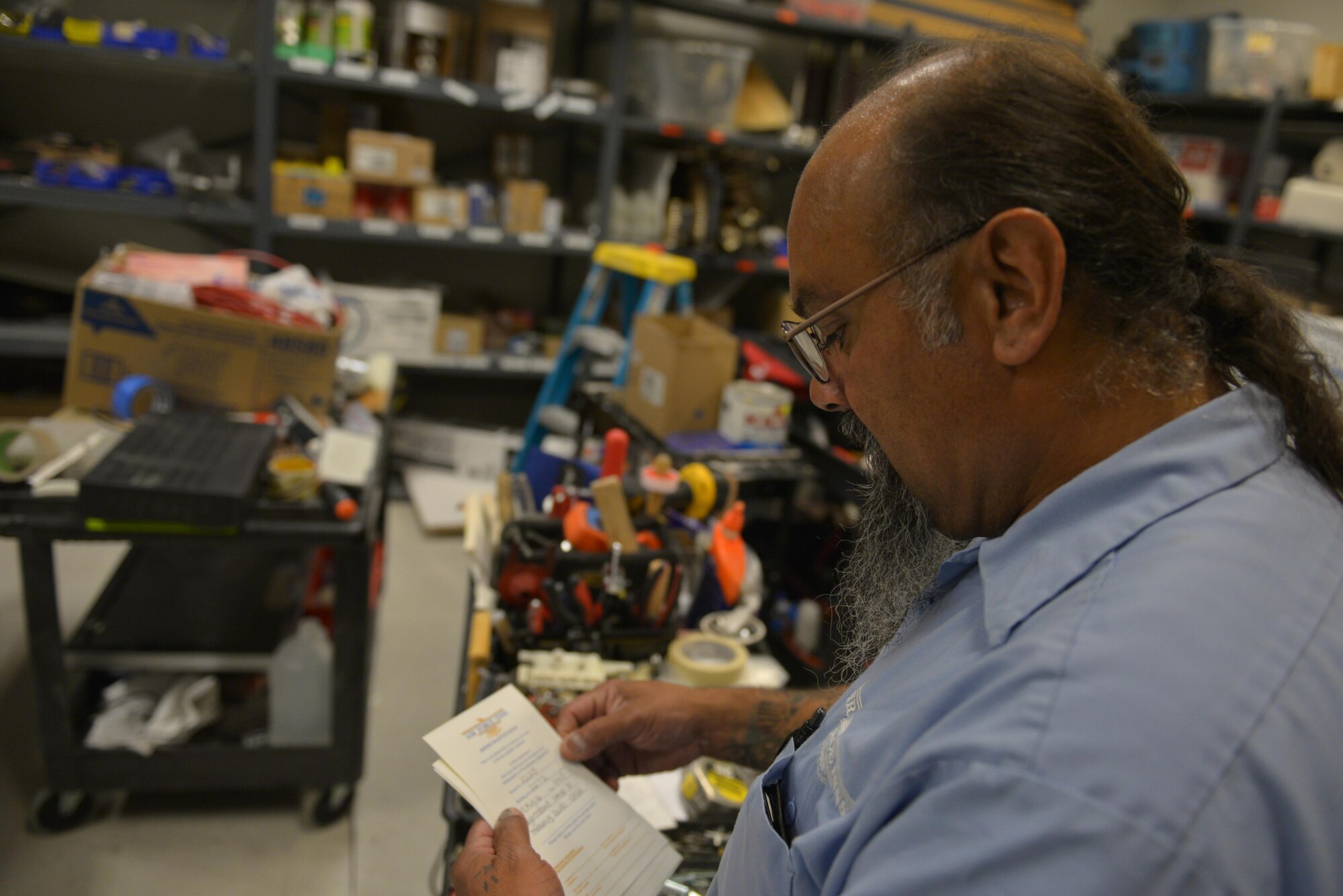 Jimmy Rodriguez, a Gold Rush Inn maintenance supervisor with the 354th Force Support Squadron, checks maintenance tickets Aug. 9, 2016, at Eielson Air Force Base, Alaska. During RF-A, the amount of maintenance tickets Rodriguez receives more than triples compared to normal operations. (U.S. Air Force photo by Airman Isaac Johnson)
