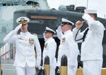 160805-N-LY160-334 JOINT BASE PEARL HARBOR-HICKAM, Hawaii (August 5, 2016) Cmdr. Travis W. Zettel, commanding officer of the Los Angeles-class fast-attack submarine USS Bremerton (SSN 698), salutes sideboys during a change of command ceremony on Joint Base Pearl Harbor-Hickam. (U.S. Navy photo by Mass Communication Specialist 2nd Class Michael H. Lee)