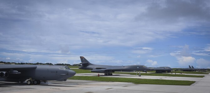 A B-52 Stratofortress, B-1 Lancer and B-2 Spirit sit next to each other on the flightline at Andersen Air Force Base, Guam, Aug.10, 2016. All three of Air Force Global Strike Command's strategic bomber aircraft are simultaneously conducting operations in the U.S. Pacific Command area of operations. The B-1 Lancer arrived at Andersen Aug. 6 to support U.S. Pacific Command’s Continuous Bomber Presence mission and rotate with the B-52s there. In addition, three B-2s arrived in theater to conduct a Bomber Assurance and Deterrence deployment. The CBP and BAAD missions are part of a long-standing history of maintaining a consistent bomber presence in the Indo-Asia-Pacific in order to maintain regional stability. (U.S. Air Force photo by Tech. Sgt. Richard Ebensberger)