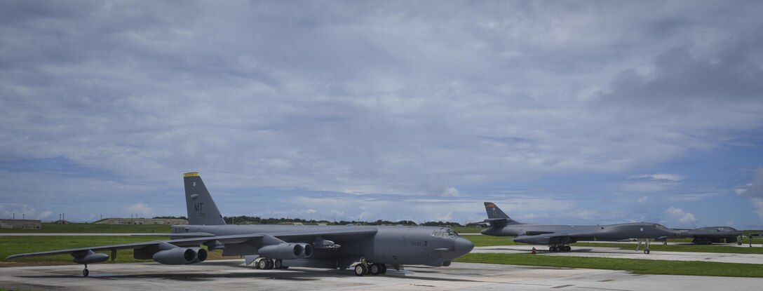 A B-52 Stratofortress, B-1 Lancer and B-2 Spirit sit beside one another on the flightline at Andersen Air Force Base, Guam, Aug.10, 2016. This marks the first time in history that all three of Air Force Global Strike Command's strategic bomber aircraft are simultaneously conducting operations in the U.S. Pacific Command area of operations. The B-1 Lancer, which arrived at Andersen Aug. 6, will replace the B-52 in support of the U.S. Pacific Command Continuous Bomber Presence mission. The CBP bomber swap between the B-1 and B-52 is occurring throughout the month of August as the B-1s return to support this mission for the first time since April 2006. In addition to the CBP bomber swap, three B-2s arrived in theater to conduct a Bomber Assurance and Deterrence deployment. The CBP mission and BAAD deployments are part of a long-standing history of maintaining a consistent bomber presence in the Indo-Asia-Pacific in order to maintain regional stability, and provide assurance to our allies and partners in the region. (U.S. Air Force photo by Tech. Sgt. Richard Ebensberger)