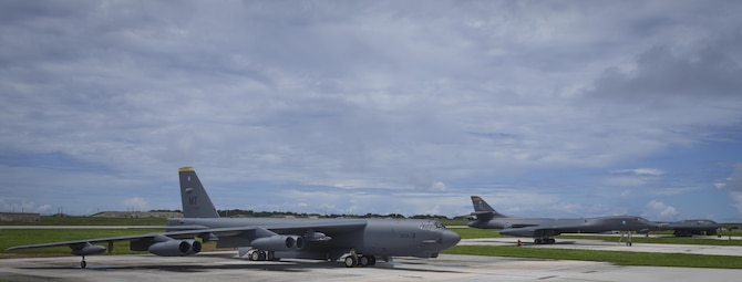 A B-52 Stratofortress, B-1 Lancer and B-2 Spirit sit beside one another on the flightline at Andersen Air Force Base, Guam, Aug.10, 2016. This marks the first time in history that all three of Air Force Global Strike Command's strategic bomber aircraft are simultaneously conducting operations in the U.S. Pacific Command area of operations. The B-1 Lancer, which arrived at Andersen Aug. 6, will replace the B-52 in support of the U.S. Pacific Command Continuous Bomber Presence mission. The CBP bomber swap between the B-1 and B-52 is occurring throughout the month of August as the B-1s return to support this mission for the first time since April 2006. In addition to the CBP bomber swap, three B-2s arrived in theater to conduct a Bomber Assurance and Deterrence deployment. The CBP mission and BAAD deployments are part of a long-standing history of maintaining a consistent bomber presence in the Indo-Asia-Pacific in order to maintain regional stability, and provide assurance to our allies and partners in the region. (U.S. Air Force photo by Tech. Sgt. Richard Ebensberger)
