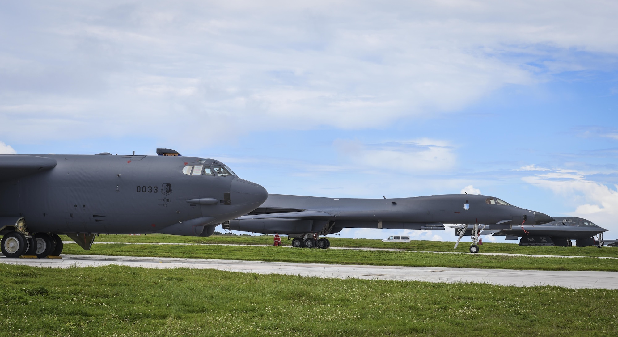 A B-52 Stratofortress, B-1 Lancer and B-2 Spirit sit beside one another on the flightline at Andersen Air Force Base, Guam, Aug.10, 2016. This marks the first time in history that all three of Air Force Global Strike Command's strategic bomber aircraft are simultaneously conducting operations in the U.S. Pacific Command area of operations. The B-1 Lancer, which arrived at Andersen Aug. 6, will replace the B-52 in support of the U.S. Pacific Command Continuous Bomber Presence mission. The CBP bomber swap between the B-1 and B-52 is occurring throughout the month of August as the B-1s return to support this mission for the first time since April 2006. In addition to the CBP bomber swap, three B-2s arrived in theater to conduct a Bomber Assurance and Deterrence deployment. The CBP mission and BAAD deployments are part of a long-standing history of maintaining a consistent bomber presence in the Indo-Asia-Pacific in order to maintain regional stability, and provide assurance to our allies and partners in the region. (U.S. Air Force photo by Tech. Sgt. Richard Ebensberger)