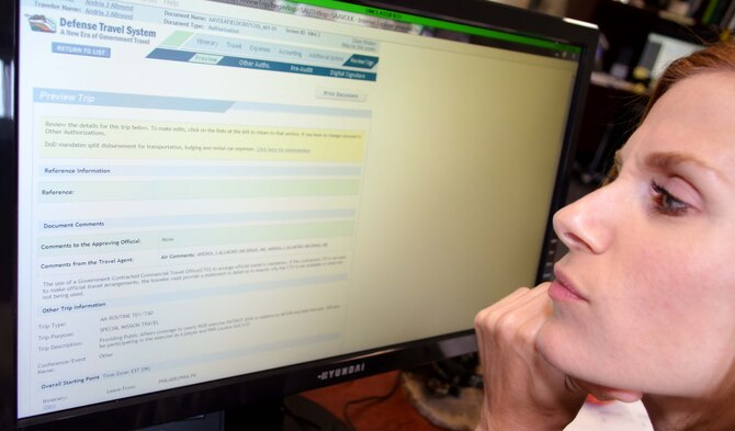 Tech. Sgt. Andria Allmond, a 111th Attack Wing photojournalist, stares in confusion at her computer screen while working in the Defense Travel System (DTS) at Horsham Air Guard Station, Pa., Aug. 8, 2016. DTS is the travel system that handles all military travel plans and travel pay for temporary duty, or in some cases home station training, for members outside the commuting area. (U.S. Air National Guard photo by Master Sgt. Christopher Botzum)