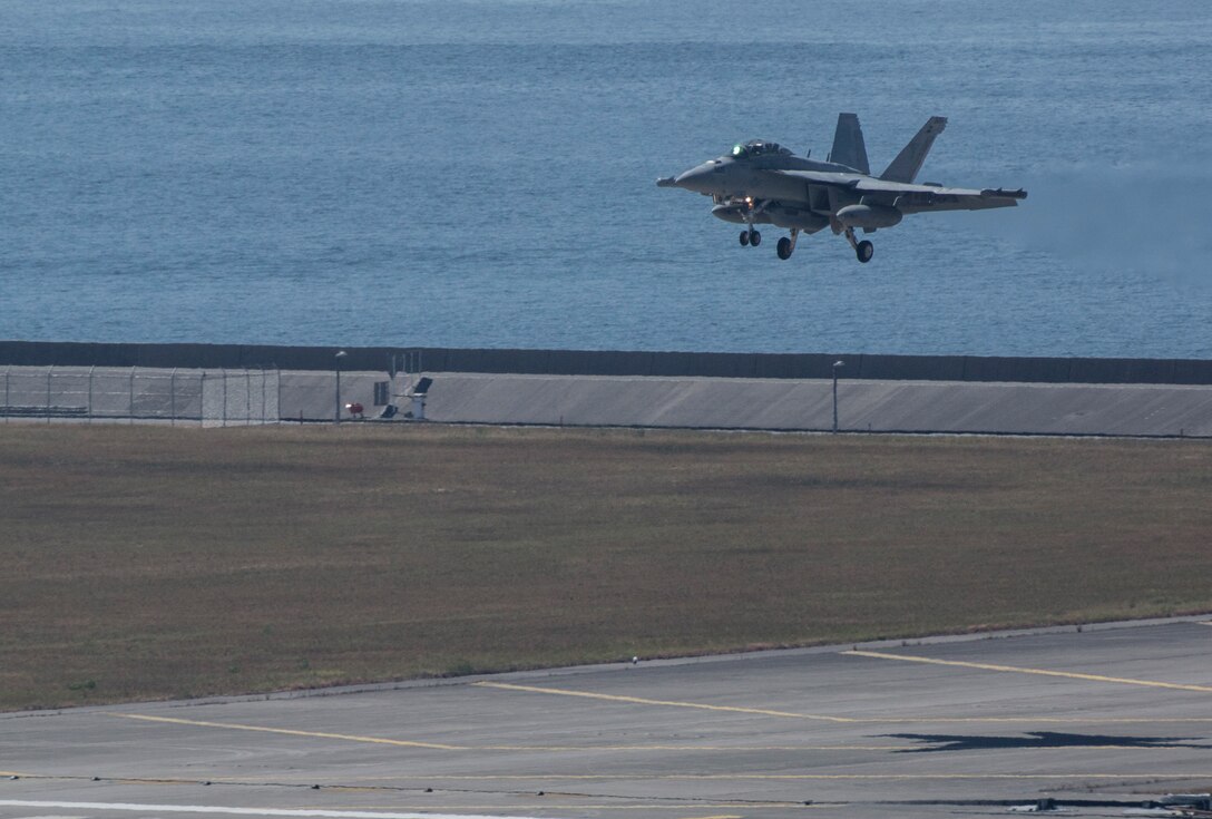 A U.S. Navy EA-18G Growler from Electronic Attack Squadron (VAQ) 141 with Carrier Air Wing (CVW) 5 out of Naval Air Facility Atsugi, Japan, conducts flight operations near Marine Corps Air Station Iwakuni, Japan, Aug. 11, 2016. The flight, observed by the Iwakuni City mayor as well as members of the press and public, provided observers some insight to the operational nature of the Growler. Carrier Air Wing 5 is expected to transition from its present home station, NAF Atsugi, to MCAS Iwakuni in the coming years. (U.S. Marine Corps photo by Cpl. Nathan Wicks)