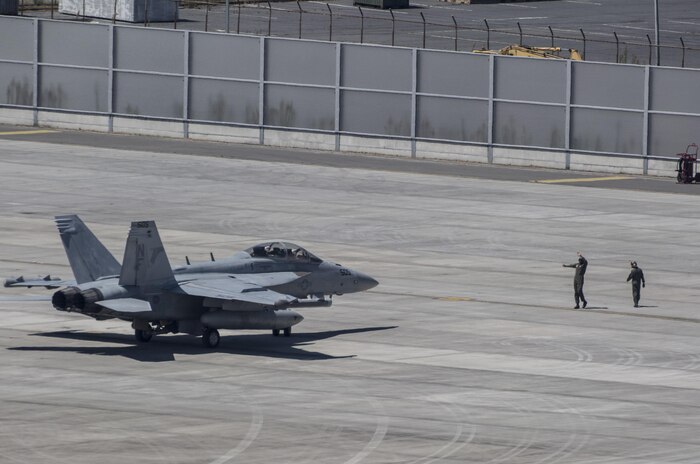 A U.S. Navy EA-18G Growler from Electronic Attack Squadron (VAQ) 141 with Carrier Air Wing (CVW) 5 out of Naval Air Facility Atsugi, Japan, conducts flight operations near Marine Corps Air Station Iwakuni, Japan, Aug. 11, 2016. The flight, observed by the Iwakuni City mayor as well as members of the press and public, provided observers some insight to the operational nature of the Growler. Carrier Air Wing 5 is expected to transition from its present home station, NAF Atsugi, to MCAS Iwakuni in the coming years. (U.S. Marine Corps photo by Cpl. Nathan Wicks)
