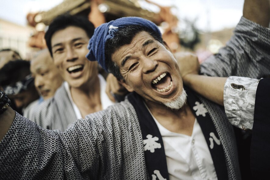 A man dances in front of a mikoshi, or portable shrine, in the 66th Annual Fussa Tanabata Festival at Fussa City, Japan, Aug. 5, 2016. Fussa, a city neighboring Yokota Air Base, hosts the festival every year, offering a local and convenient option for Yokota members to experience Japanese culture. (U.S. Air Force photo by Senior Airman Delano Scott/Released)
