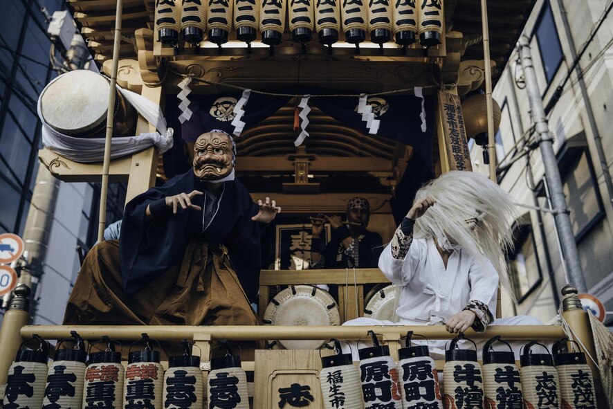 Performers dance on a mikoshi, or portable shrine, in the 66th Annual Fussa Tanabata Festival at Fussa City, Japan, Aug. 5, 2016. Fussa, a city neighboring Yokota Air Base, hosts the festival every year, offering a local and convenient option for Yokota members to experience Japanese culture. (U.S. Air Force photo by Senior Airman Delano Scott/Released)