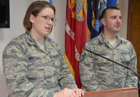 Capt. Kristin Montville and Tech. Sgt. Jonathan Colwell prepare an intelligence briefing for senior leadership at an undisclosed location in Southwest Asia, Aug. 4, 2016. The reservists are deployed from the 439th Operations Support Squadron’s intelligence section at Westover Air Reserve Base, Mass. They’re assigned to Air Force Central Command’s 386th Air Expeditionary Wing. (US Air Force photo/Master Sgt. Andrew Biscoe)