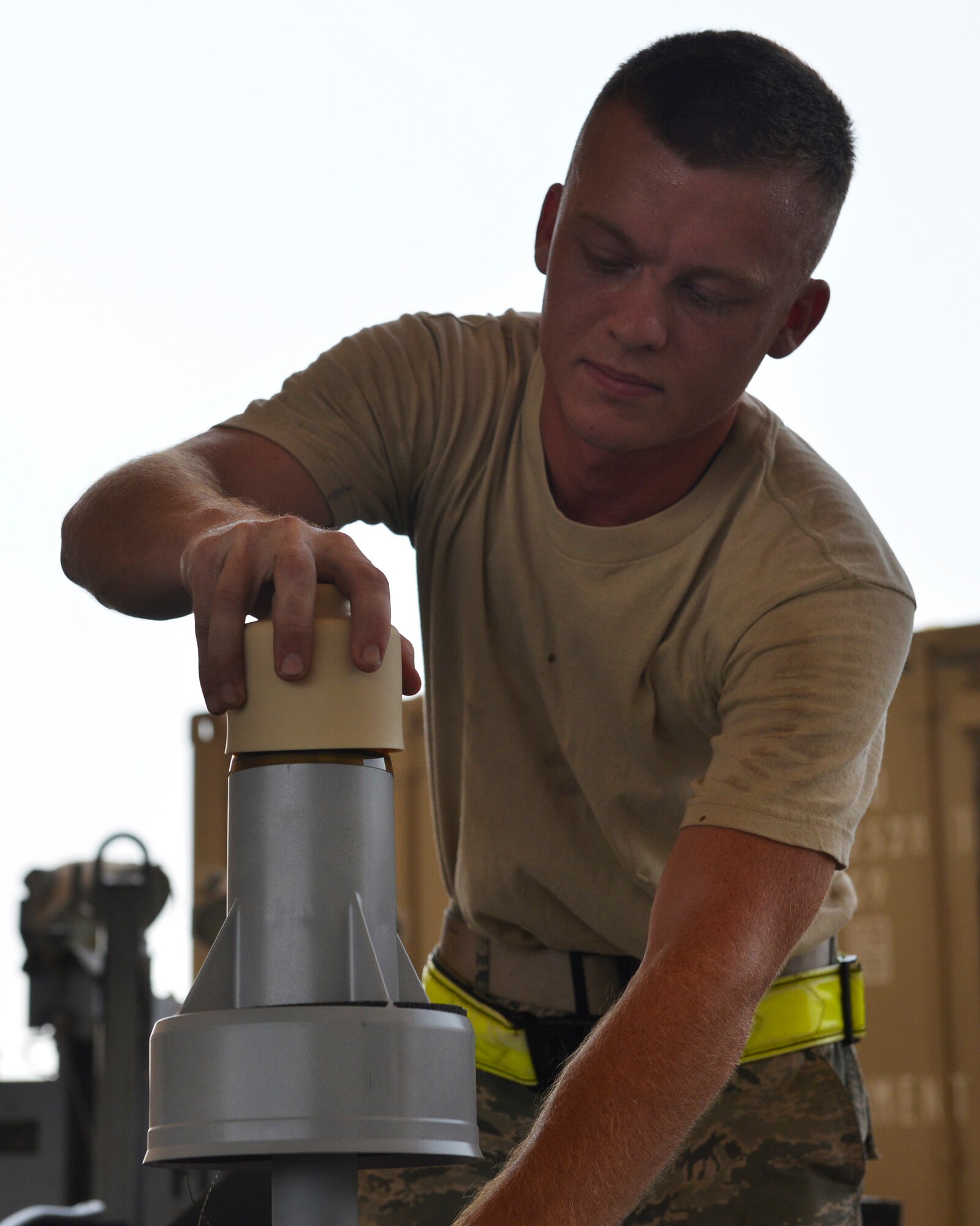 An Airman assigned to the 380th Expeditionary Maintenance Squadron tests a precision guided munition at an undisclosed location. A flight of munitions experts have built, maintained and delivered the nearly 2,100 weapons the 380th Air Expeditionary Wing has employed since the beginning of 2016. (U.S. Air Force photo by Capt Sybil Taunton)