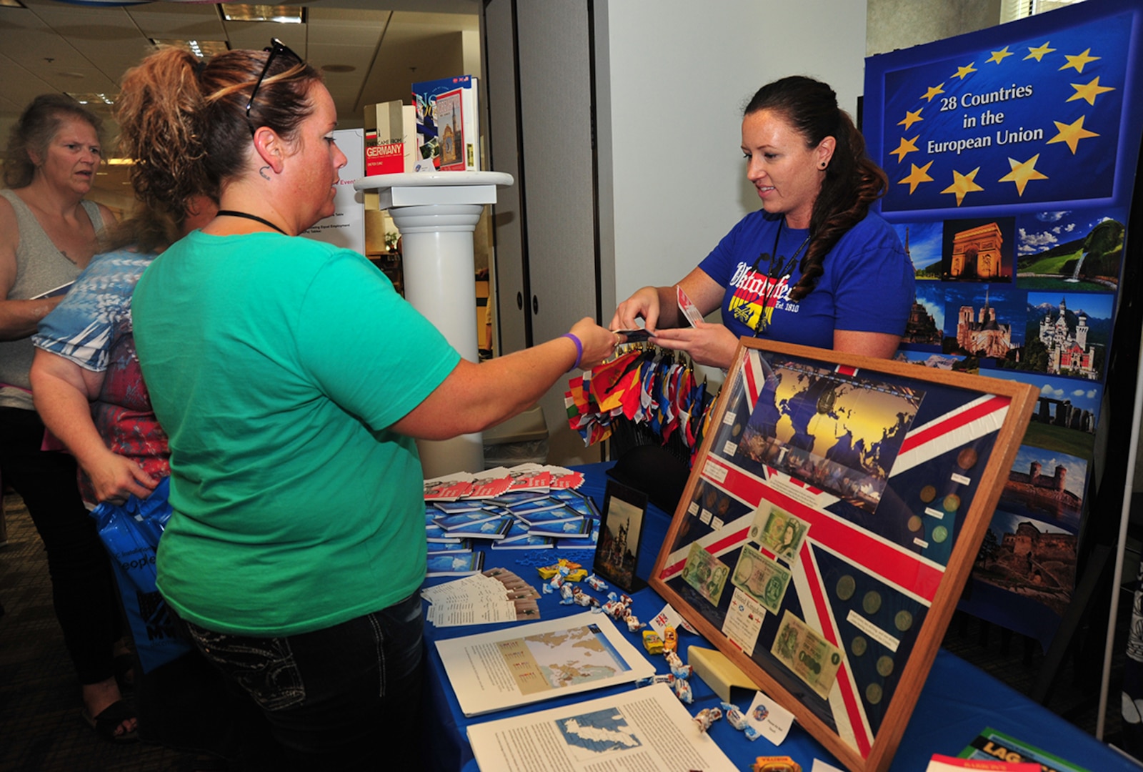 Associates look over one of the cultural displays on hand during Defense Supply Center Columbus’ 2016 Installation People and Culture Day. The Aug. 3 event was coordinated by the Defense Finance Accounting Services and Defense Logistics Agency special emphasis programs and the DSCC Family Morale Welfare and Recreation program.  