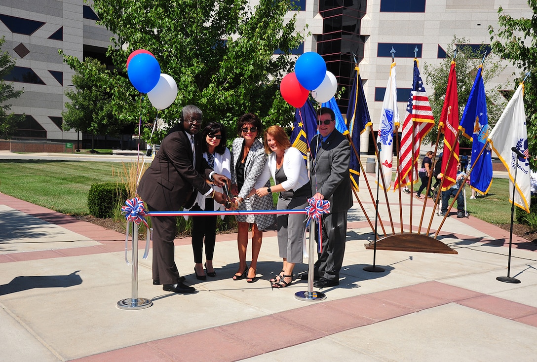 (From left) Milton Lewis, Land and Maritime acquisition executive; Kim Maggard, mayor of Whitehall; Pamela Franceschi, site director for DFAS-Columbus; Rebecca Beck, DFAS-Columbus deputy director; and Dan Bell, installation site director