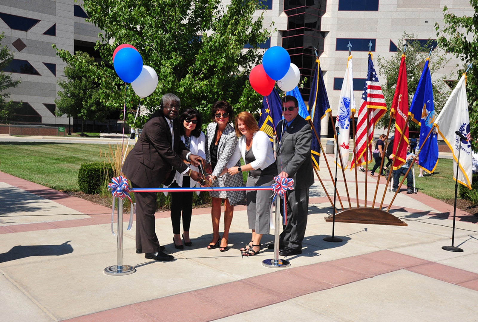 (From left) Milton Lewis, Land and Maritime acquisition executive; Kim Maggard, mayor of Whitehall; Pamela Franceschi, site director for DFAS-Columbus; Rebecca Beck, DFAS-Columbus deputy director; and Dan Bell, installation site director