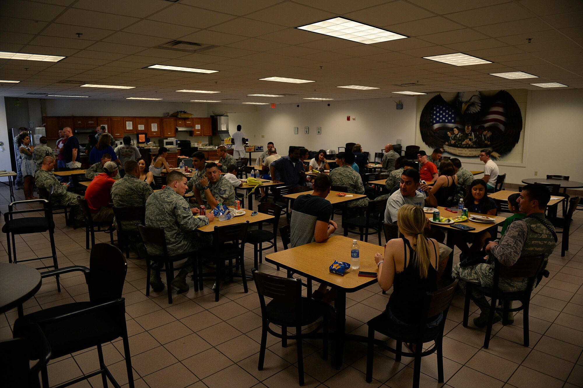 Airmen from the 82nd Security Forces Squadron, visit with each other during a welcome home lunch at Sheppard Air Force Base, Texas, Aug. 5, 2016, for nearly 25 Airmen who recently returned from deployment to Southwest Asia. The Airmen deployed in support of Operation Enduring Freedom and provided, base defense, weapons system security, force protection and security for nearly two to three billion dollars in assets. (U.S. Air Force photo by Senior Airman 