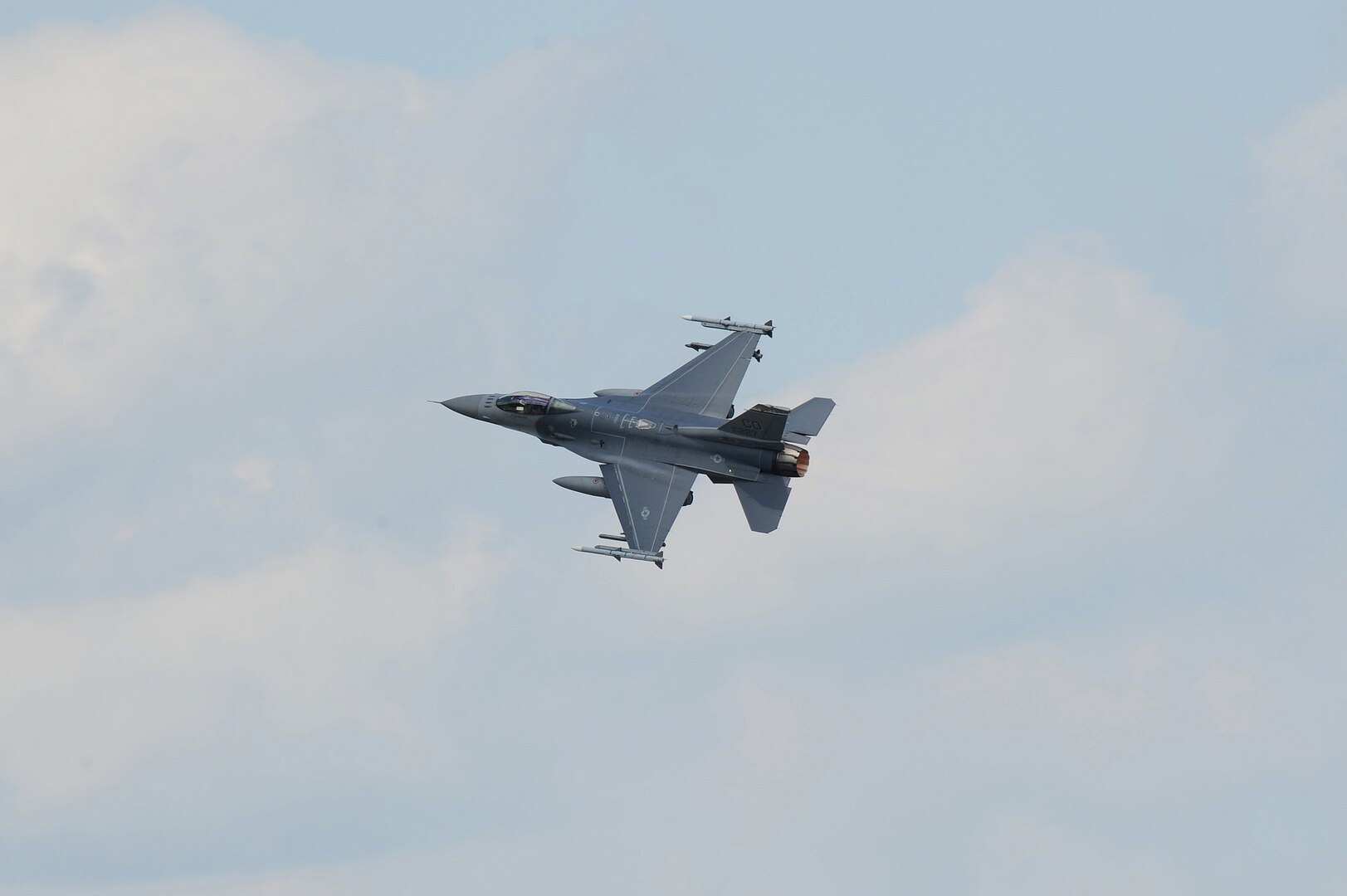 A U.S. F-16 Fighting Falcon aircraft from the 140th Wing, Colorado Air National Guard, is in flight over Pápa Air Base, Pápa, Hungary, in support of Operation Panther Strike after returning from a training mission in eastern Europe, July 19, 2016.  In conjunction with Operation Atlantic Resolve, the 140th Wing, Colorado Air National Guard, from Buckley Air Force Base, Colorado, has deployed approximately 200 Airmen to Pápa Air Base, Hungary, to conduct familiarization training.