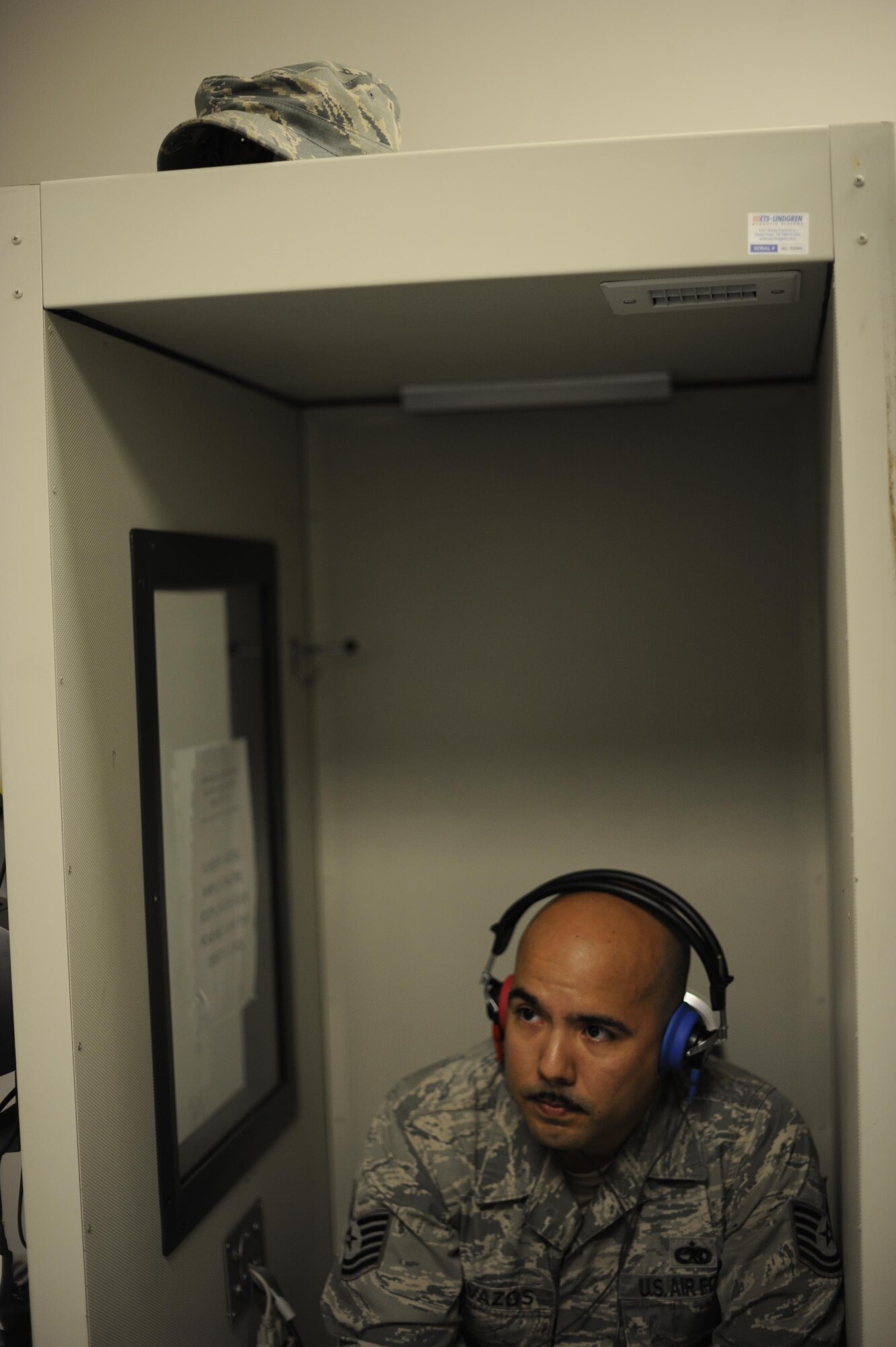 Tech. Sgt. Daniel Cavazos, 305th Aircraft Maintenance Squadron flight line expeditor, takes an audiogram (hearing test) at the 87th Medical Group on Joint Base-McGuire-Dix-Lakehurst, N.J., Aug. 10, 2016. It can be challenging for Cavazos and other night shift workers from the 305th AMXS to attend appointments during normal hours. The 87th Medical Group stayed late to ensure appointments were available for Airmen who work these types of shifts. 