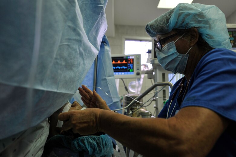 U.S. Army Lt. Col. Catherine Devito, Joint Task Force-Bravo Medical Element certified registered nurse anesthetist, monitors a patient’s airway during a MEDEL Mobile Surgical Team operation at the Dr. Salvador Paredes Hospital in Trujillo, Honduras, July 28, 2016. The current MST rotation has performed more than 180 surgeries throughout Honduras.