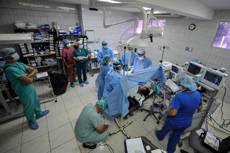 Members of the Joint Task Force-Bravo Medical Element Mobile Surgical Team perform an open cholecystectomy on a patient during a MEDEL MST operation at the Dr. Salvador Paredes Hospital in Trujillo, Honduras, July 28, 2016. The MST is a self-sustaining unit that utilizes their own equipment and operates out of various facilities throughout Honduras to provide free surgeries to patients in need.