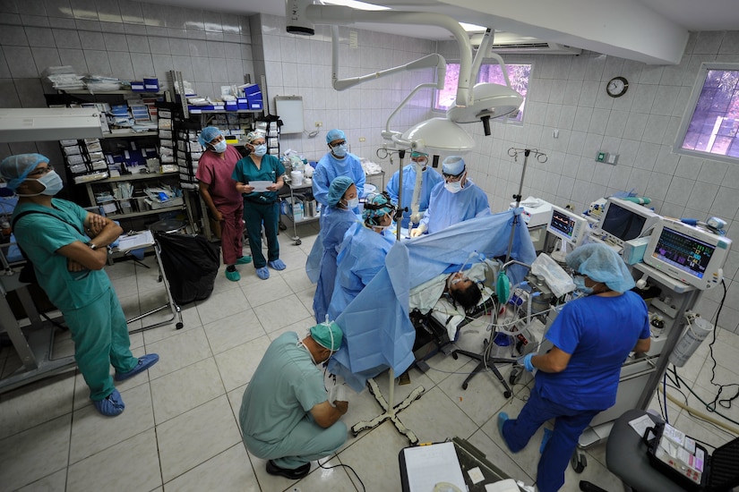 Members of the Joint Task Force-Bravo Medical Element Mobile Surgical Team perform an open cholecystectomy on a patient during a MEDEL MST operation at the Dr. Salvador Paredes Hospital in Trujillo, Honduras, July 28, 2016. The MST is a self-sustaining unit that utilizes their own equipment and operates out of various facilities throughout Honduras to provide free surgeries to patients in need.