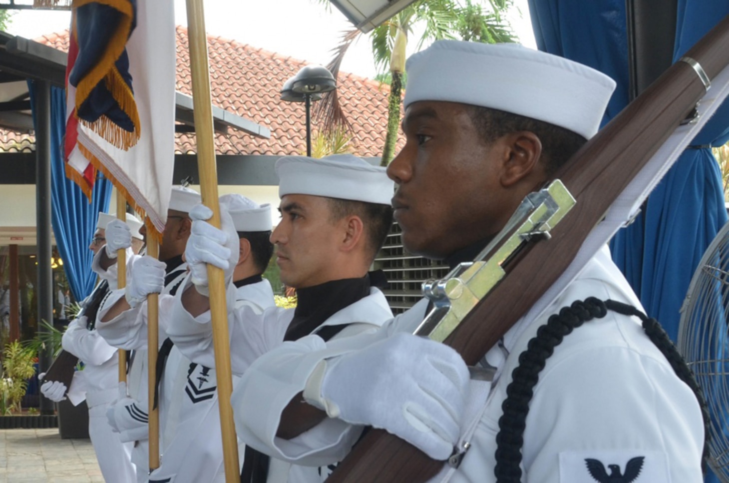 Navy Region Singapore Color Guard prepares to parade the colors during a Change of Command ceremony at the Terror Club August 11. Rear Admiral Brian S. Hurley was relieved by Rear Admiral Donald D. Gabrielson as Commander, Logistics Western Pacific/CTF 73. 